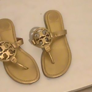 Gold Tory Burch slides